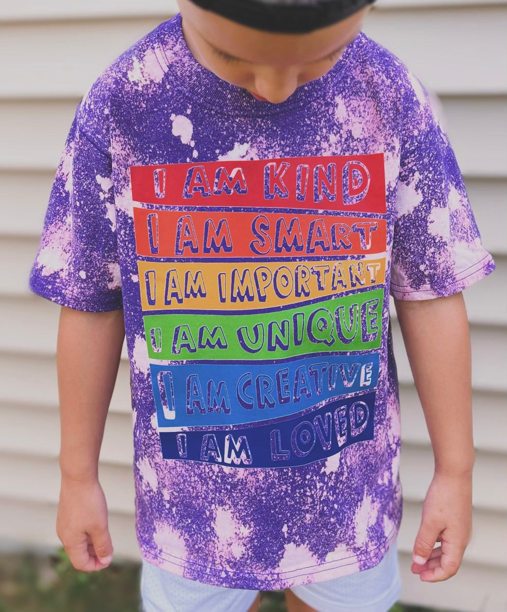 I am… Bleached Affirmations Graphic Tee (Purple)