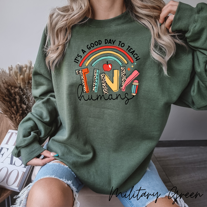 Teaching Tiny Humans Crewneck